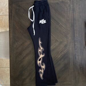 Stylish Black Pants with Tan Flame Design